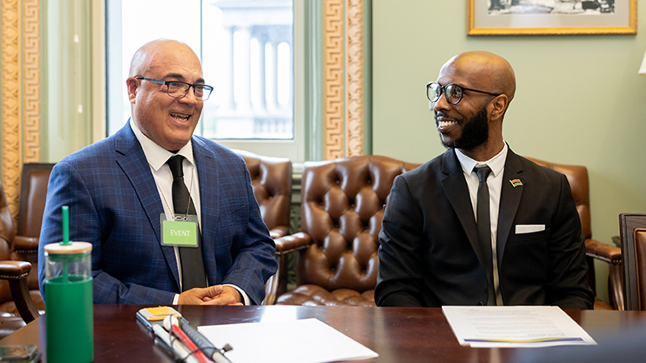 Luis F. Pérez, Disability & Digital Inclusion Lead at CAST, left, with Brandon Woodland, Teacher, Bridges Public Charter School.