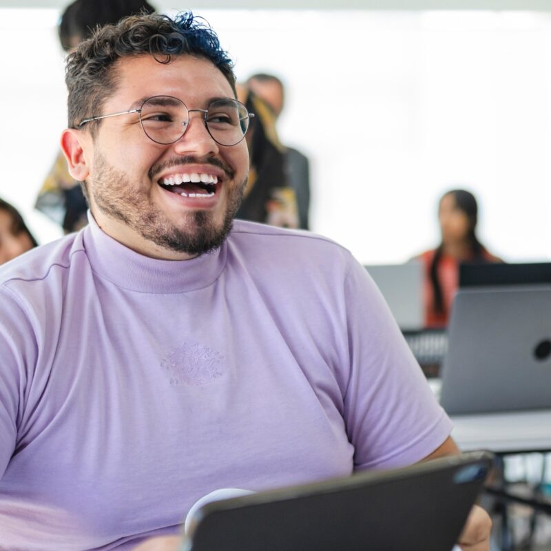 Smiling lgbtq youth at university