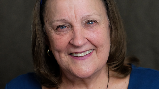 Headshot photo of Joy Smiley Zabala